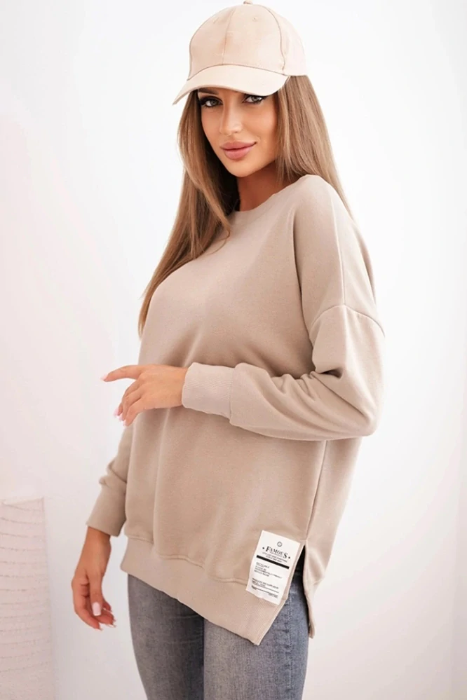 Dámska svetlo béžová oversize mikina s nášivkou Famous