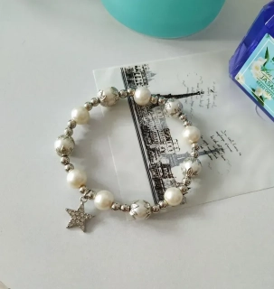 Dámsky náramok s príveskami Pearl star